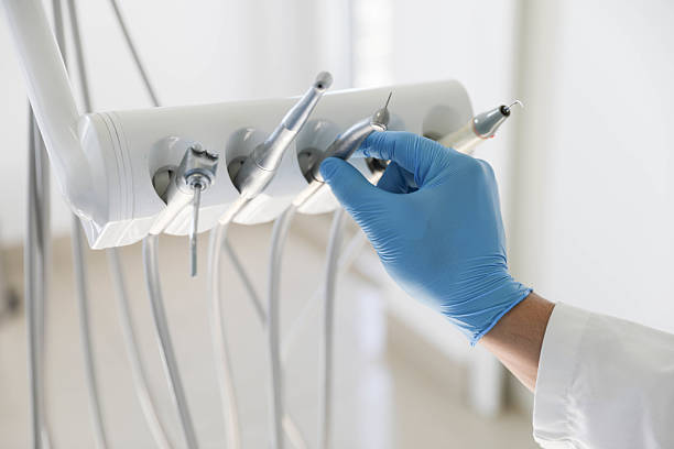 Professional Tooth Extraction technician working in Ravenna, MI